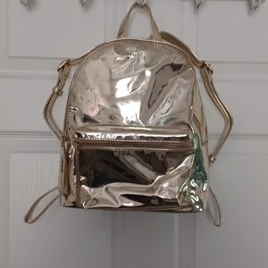 Urban Expressions gold backpack purse